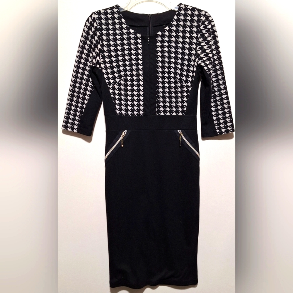 BLACK AND WHITE HOUNDSTOOTH FITTED KNEE LENGTH DRESS. ZIPS IN FRONT & BACK.